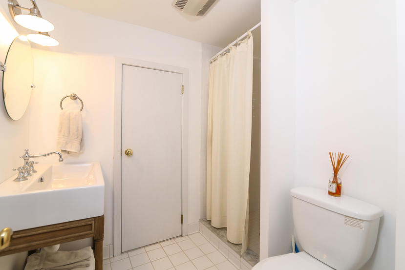 17 Goodwives River Road Darien, CT 06820 - Photo 42 of 51 a bathroom with a sink and a mirror