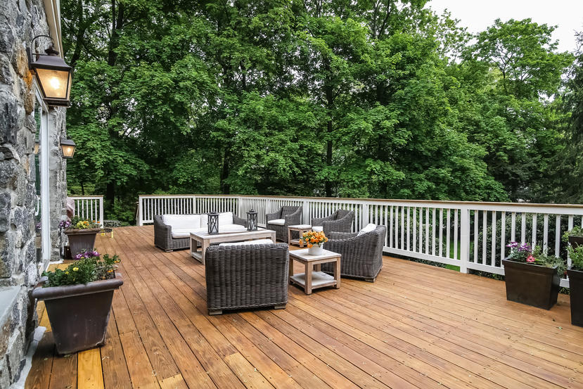 17 Goodwives River Road Darien, CT 06820 - Photo 45 of 51 a roof deck with couches and wooden floor
