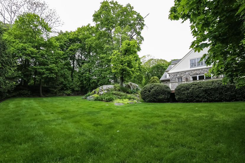 17 Goodwives River Road Darien, CT 06820 - Photo 46 of 51 a view of a house with a backyard