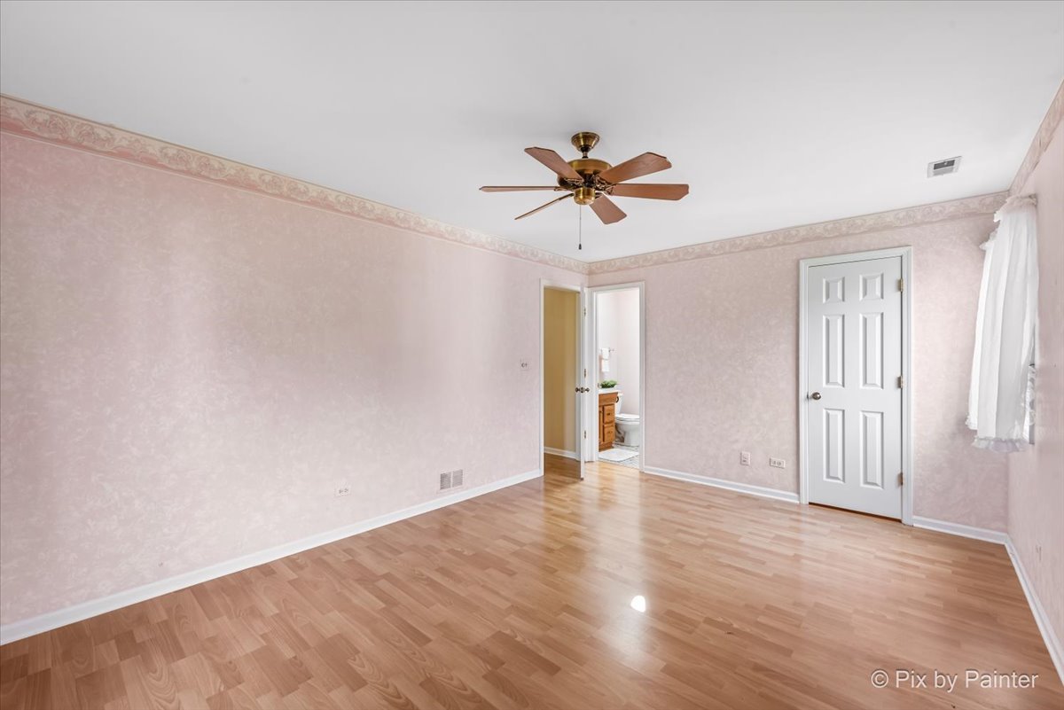 -n021 Windermere Road, Unit 405 Winfield, IL 60190 - Photo 21 of 50 a view of an empty room with a window