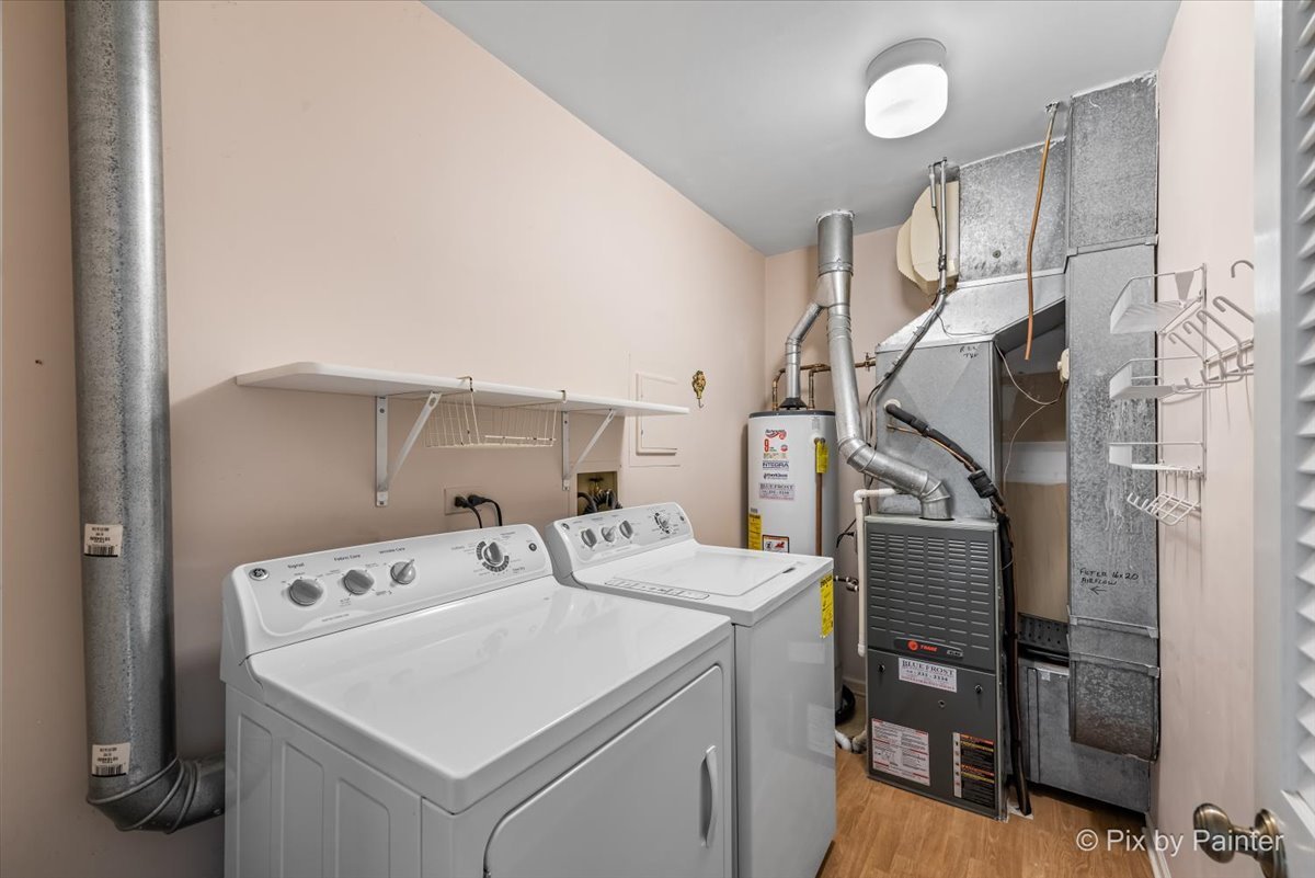 -n021 Windermere Road, Unit 405 Winfield, IL 60190 - Photo 24 of 50 a utility room with dryer and washer