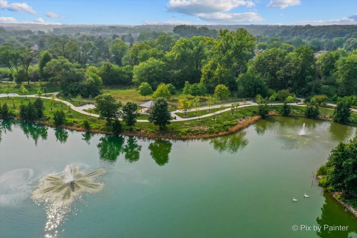 -n021 Windermere Road, Unit 405 Winfield, IL 60190 - Photo 27 of 50 a view of a lake with a yard