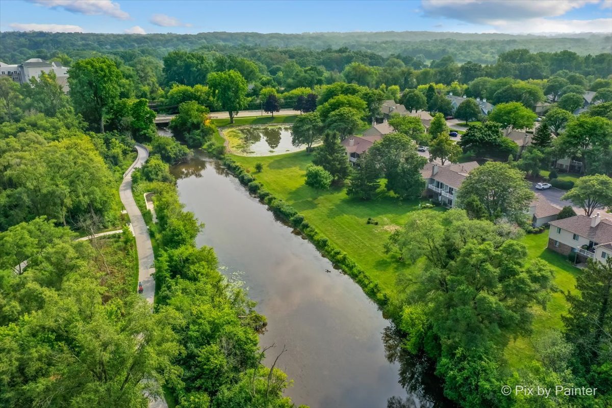 -n021 Windermere Road, Unit 405 Winfield, IL 60190 - Photo 30 of 50 a view of a garden with an ocean