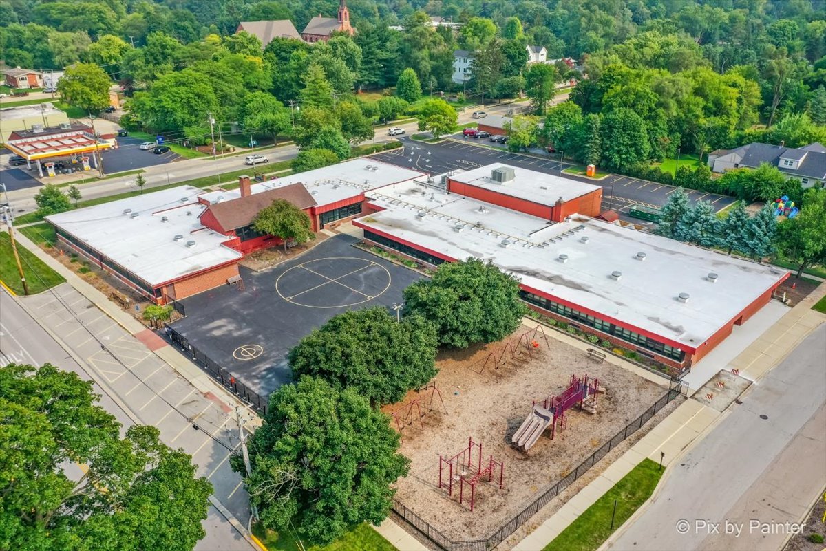 -n021 Windermere Road, Unit 405 Winfield, IL 60190 - Photo 32 of 50 an aerial view of a house with outdoor space