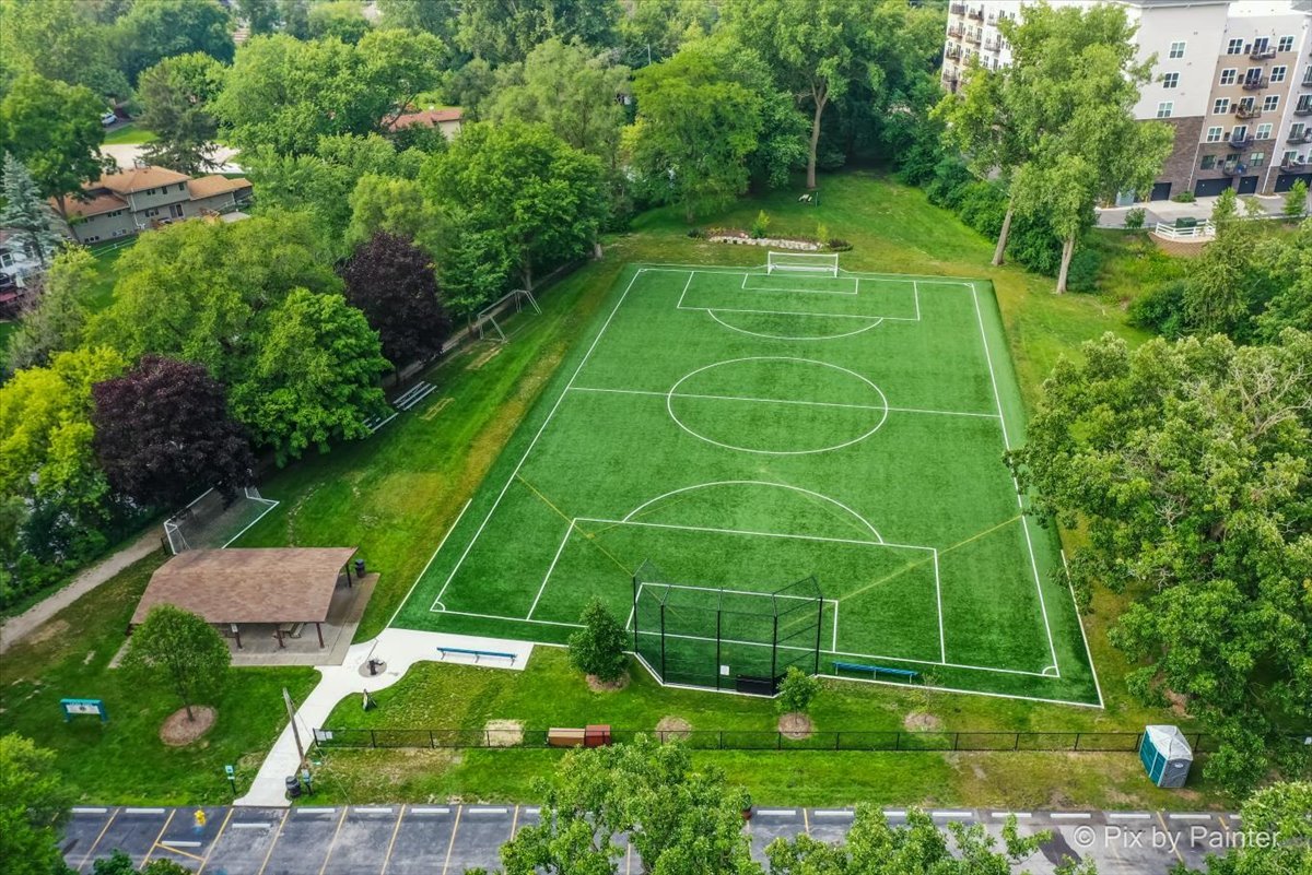 -n021 Windermere Road, Unit 405 Winfield, IL 60190 - Photo 33 of 50 a view of an outdoor space and tennis court