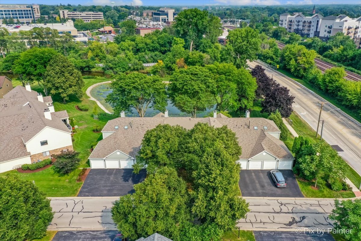 -n021 Windermere Road, Unit 405 Winfield, IL 60190 - Photo 44 of 50 an aerial view of a house with garden space and street view