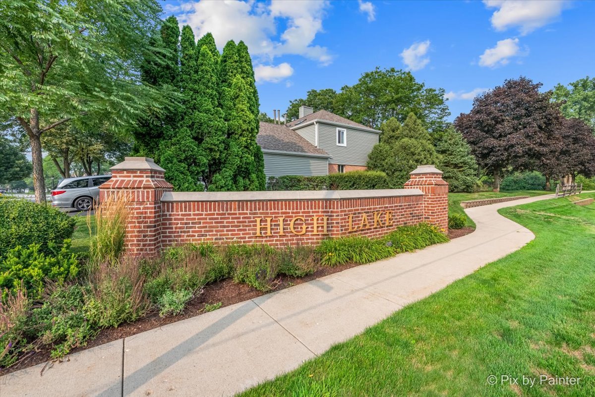 -n021 Windermere Road, Unit 405 Winfield, IL 60190 - Photo 48 of 50 a view of green field with a house in the background