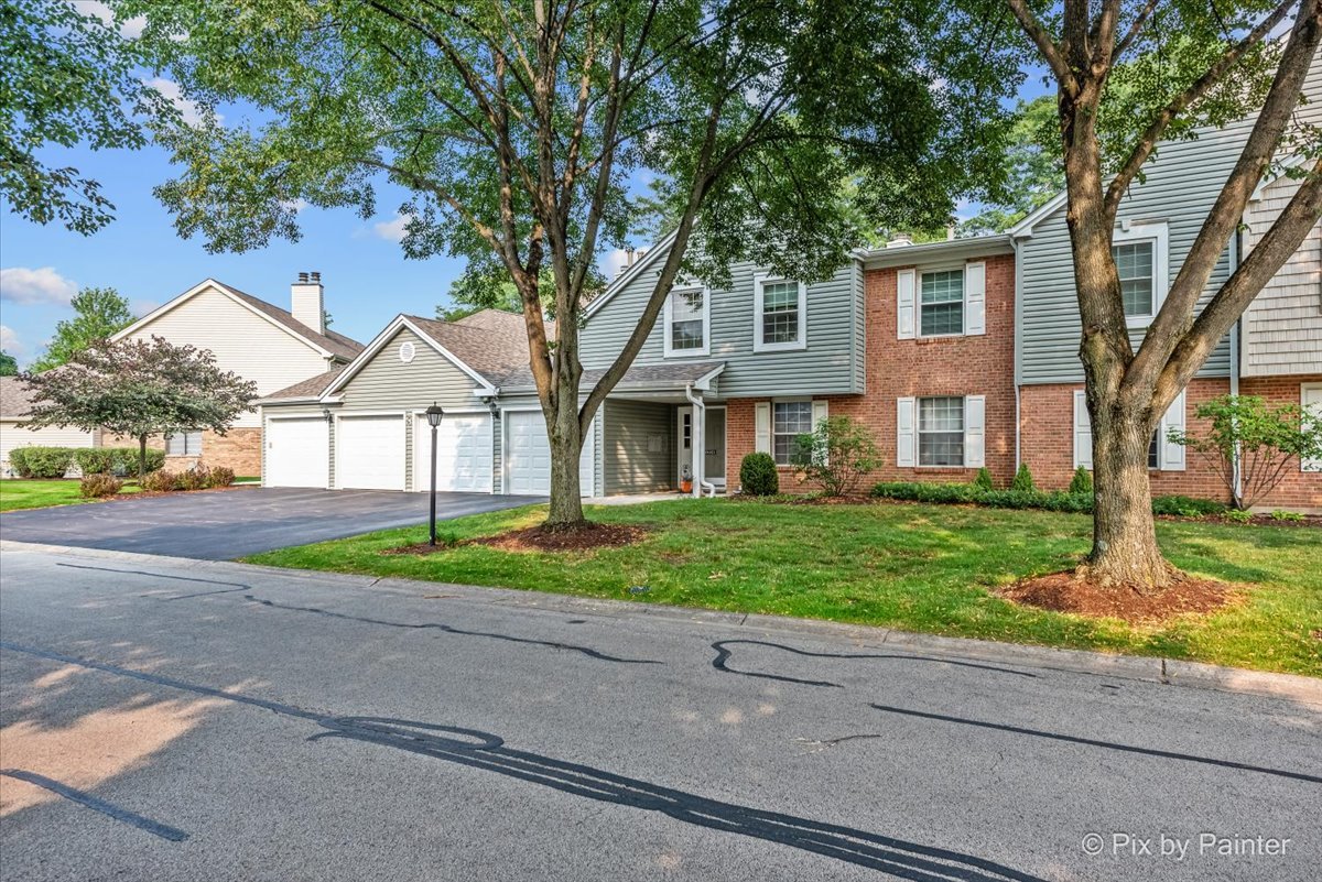 -n021 Windermere Road, Unit 405 Winfield, IL 60190 - Photo 50 of 50 front view of house with a yard