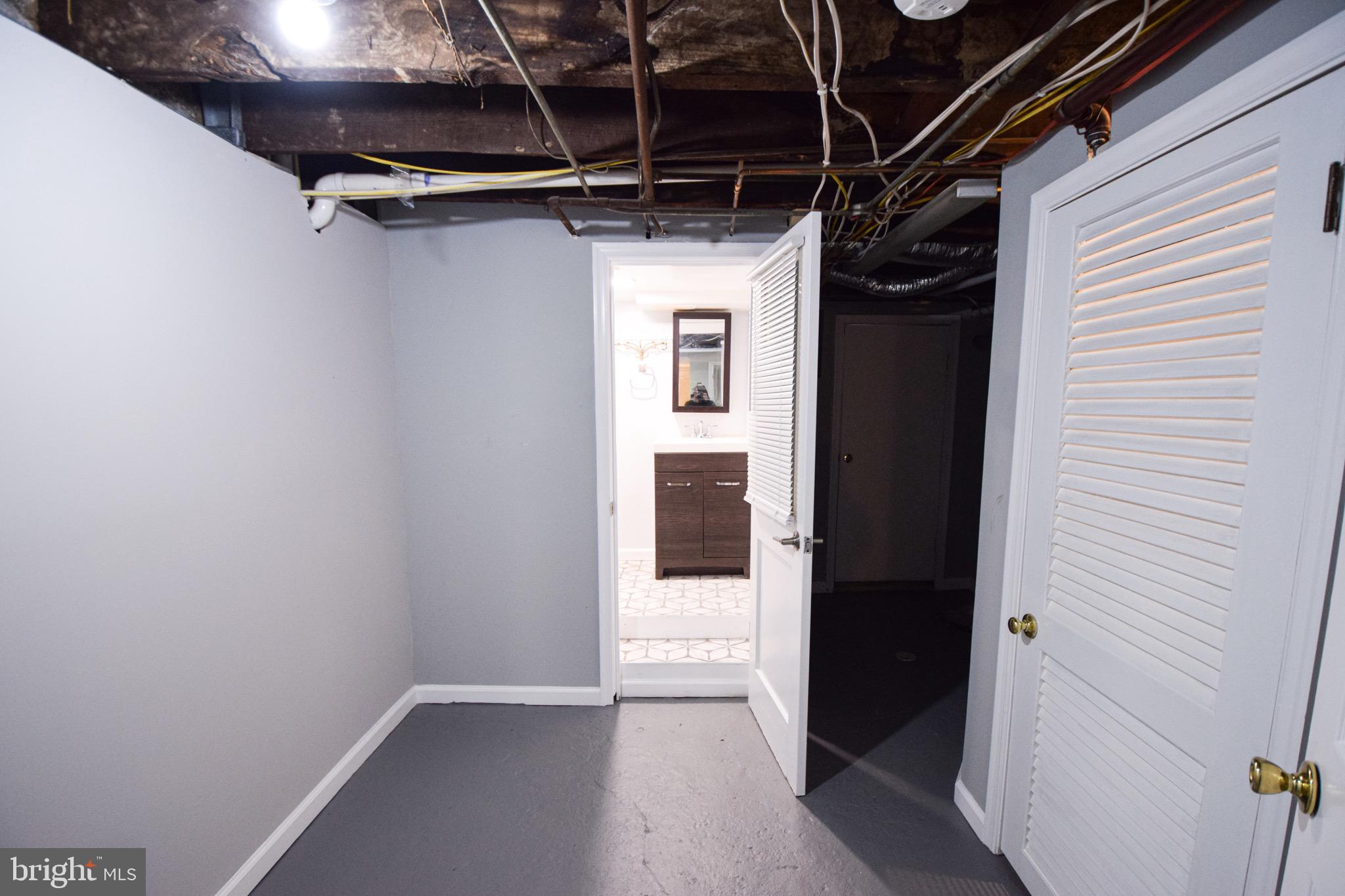 2542 West Pratt Street Baltimore, MD 21223 - Photo 29 of 44 Hallway to Bathroom & Backdoor