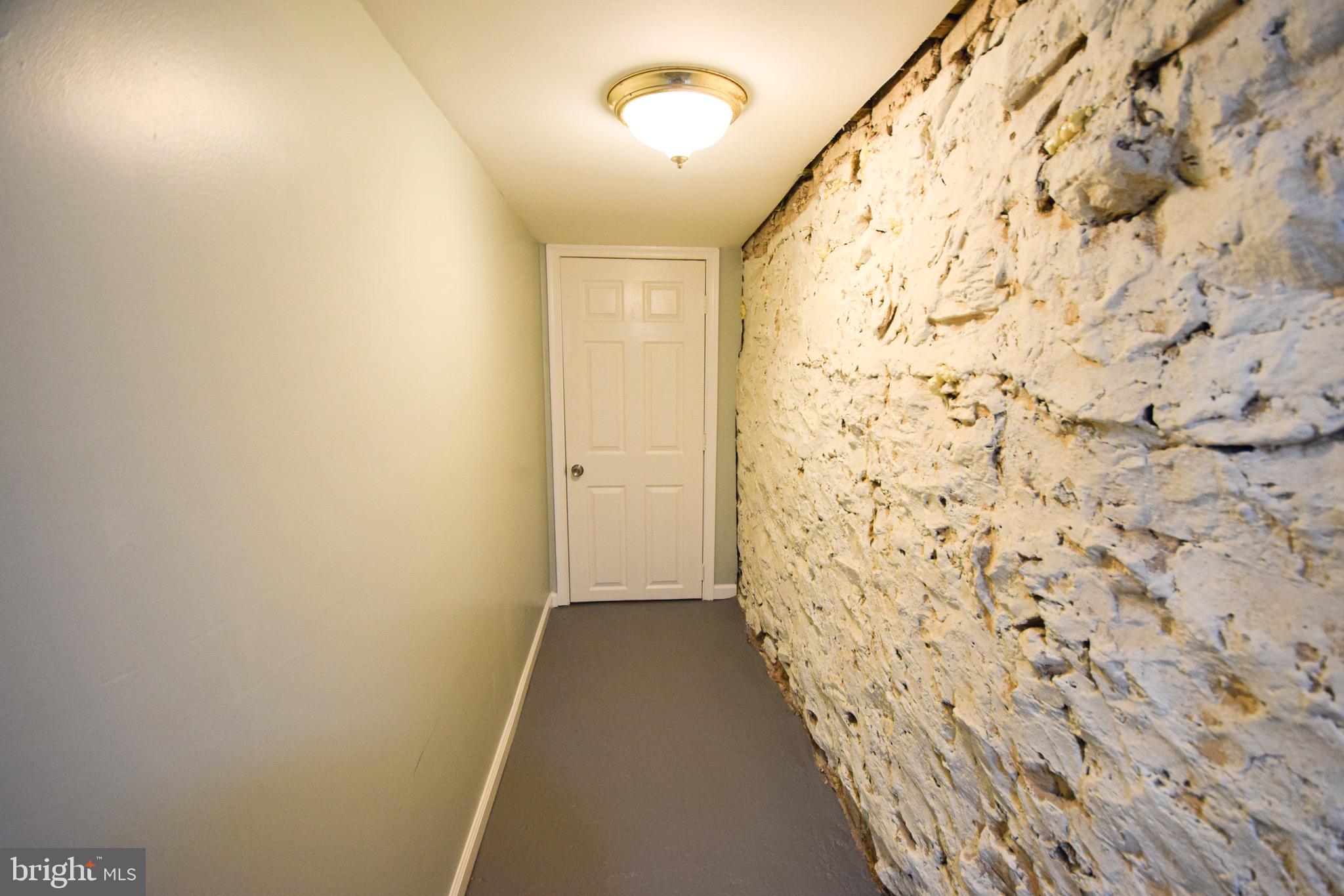 2542 West Pratt Street Baltimore, MD 21223 - Photo 36 of 44 Basement Hallway