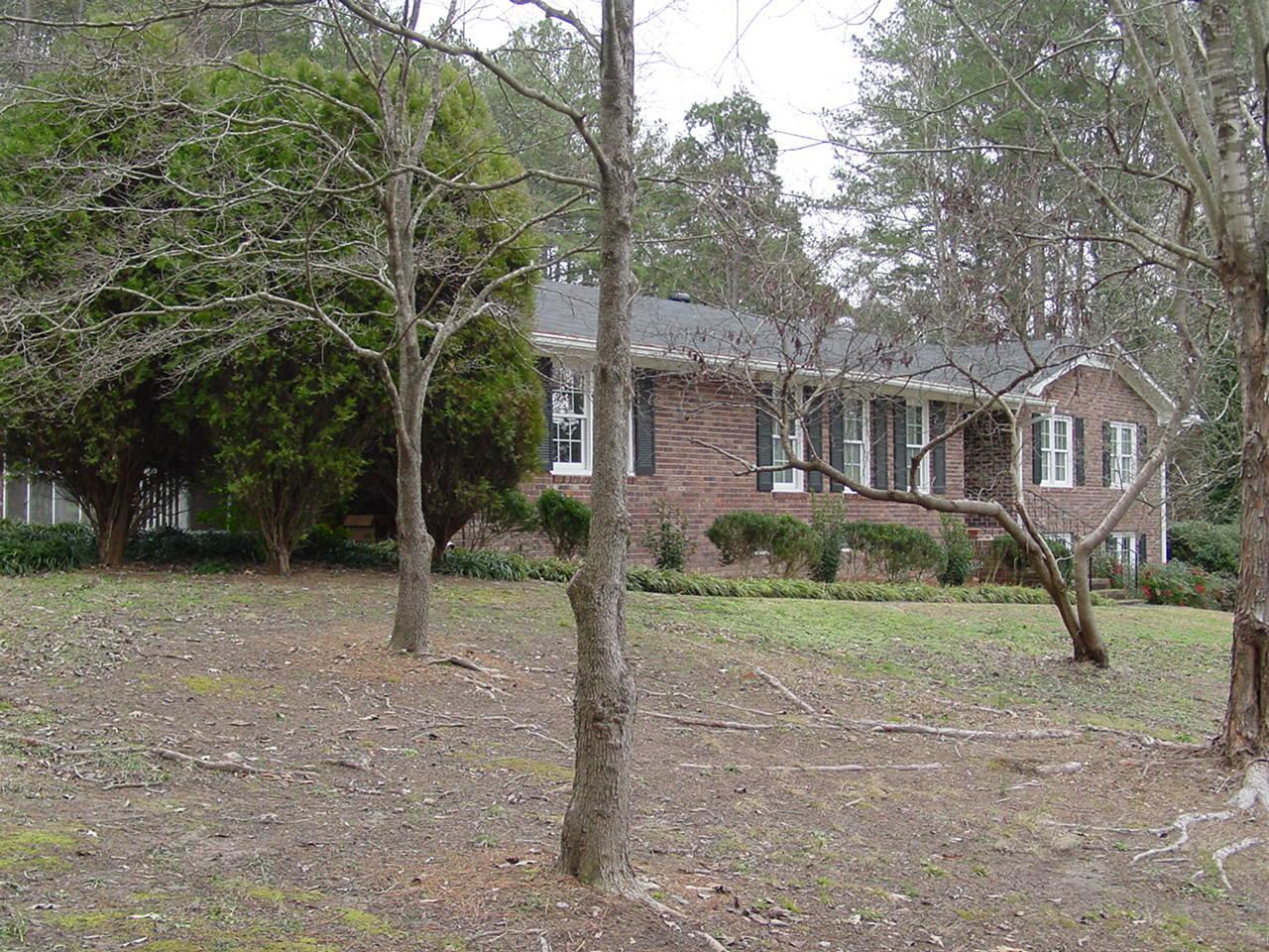 15 Ford Road Southeast, Unit 33 & 34 Rome, GA 30161 - Photo 1 of 1 a view of a big house with a yard and large tree