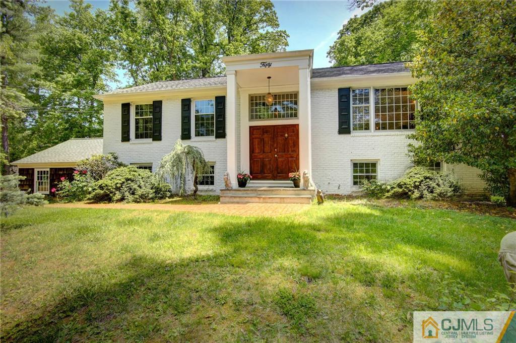 50 Wallace Road Middletown, NJ 07748 - Photo 1 of 24 a view of a house with backyard and garden