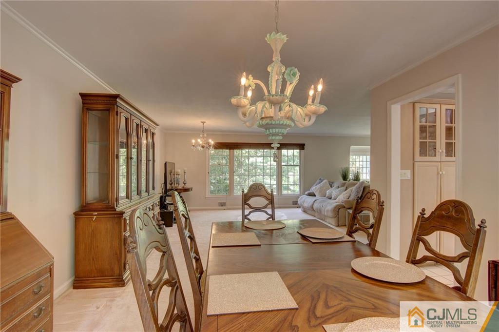 50 Wallace Road Middletown, NJ 07748 - Photo 16 of 24 a view of a dining room with furniture window and outside view