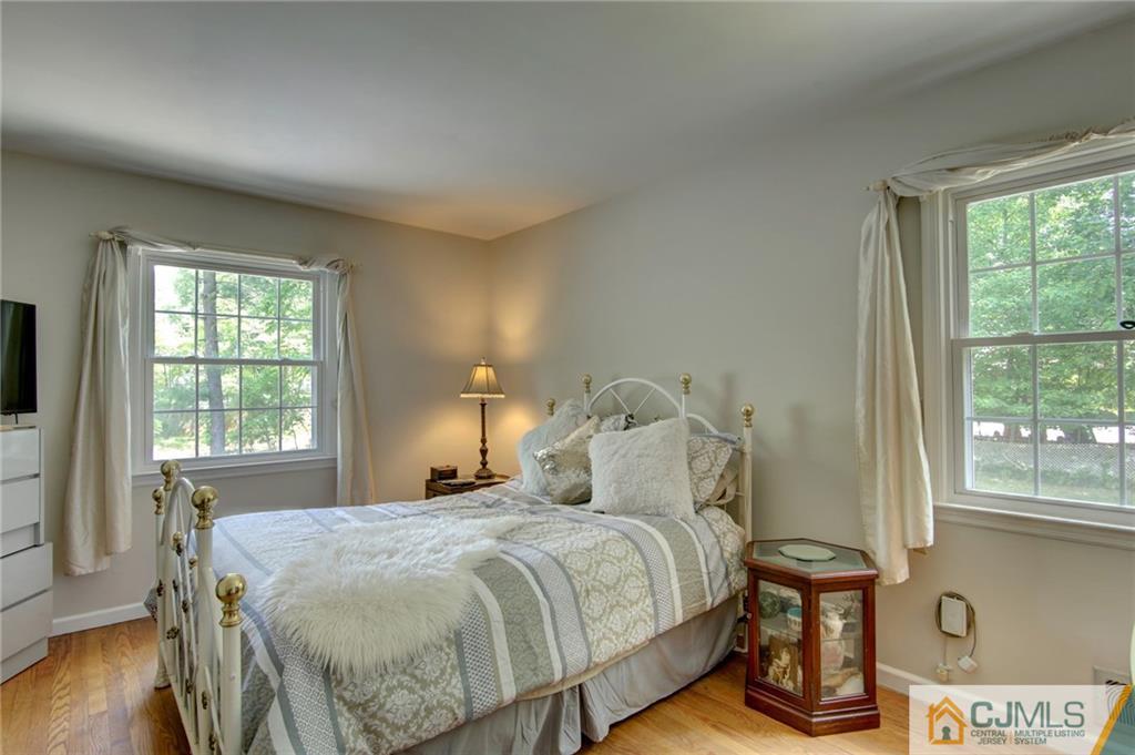 50 Wallace Road Middletown, NJ 07748 - Photo 18 of 24 a bedroom with a bed and window