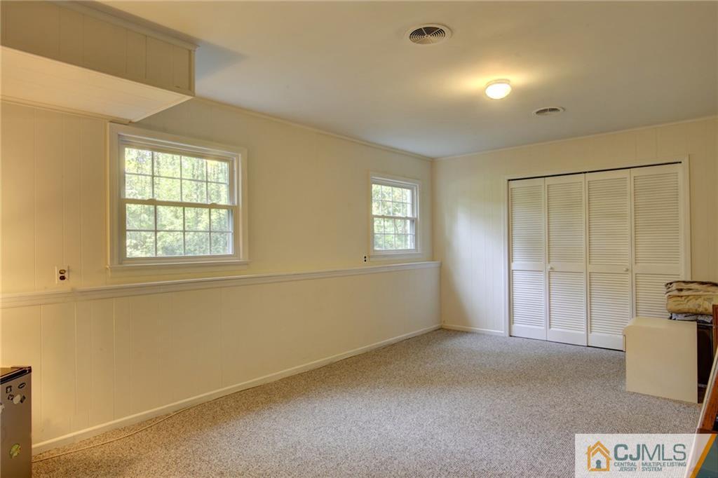 50 Wallace Road Middletown, NJ 07748 - Photo 21 of 24 a view of an empty room with a window