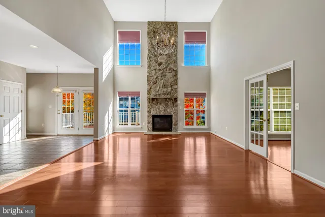 a view of an empty room and closet area