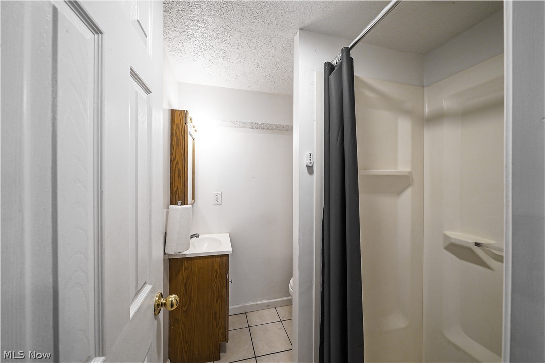 8604-8606 Biddulph Road Brooklyn, OH 44144 - Photo 7 of 29 Basement Bathroom