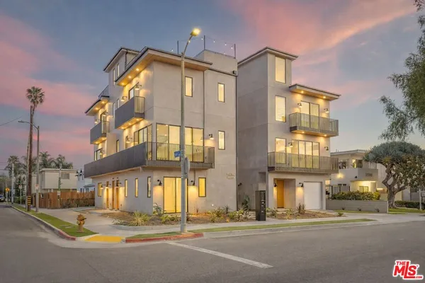a view of a building with a street