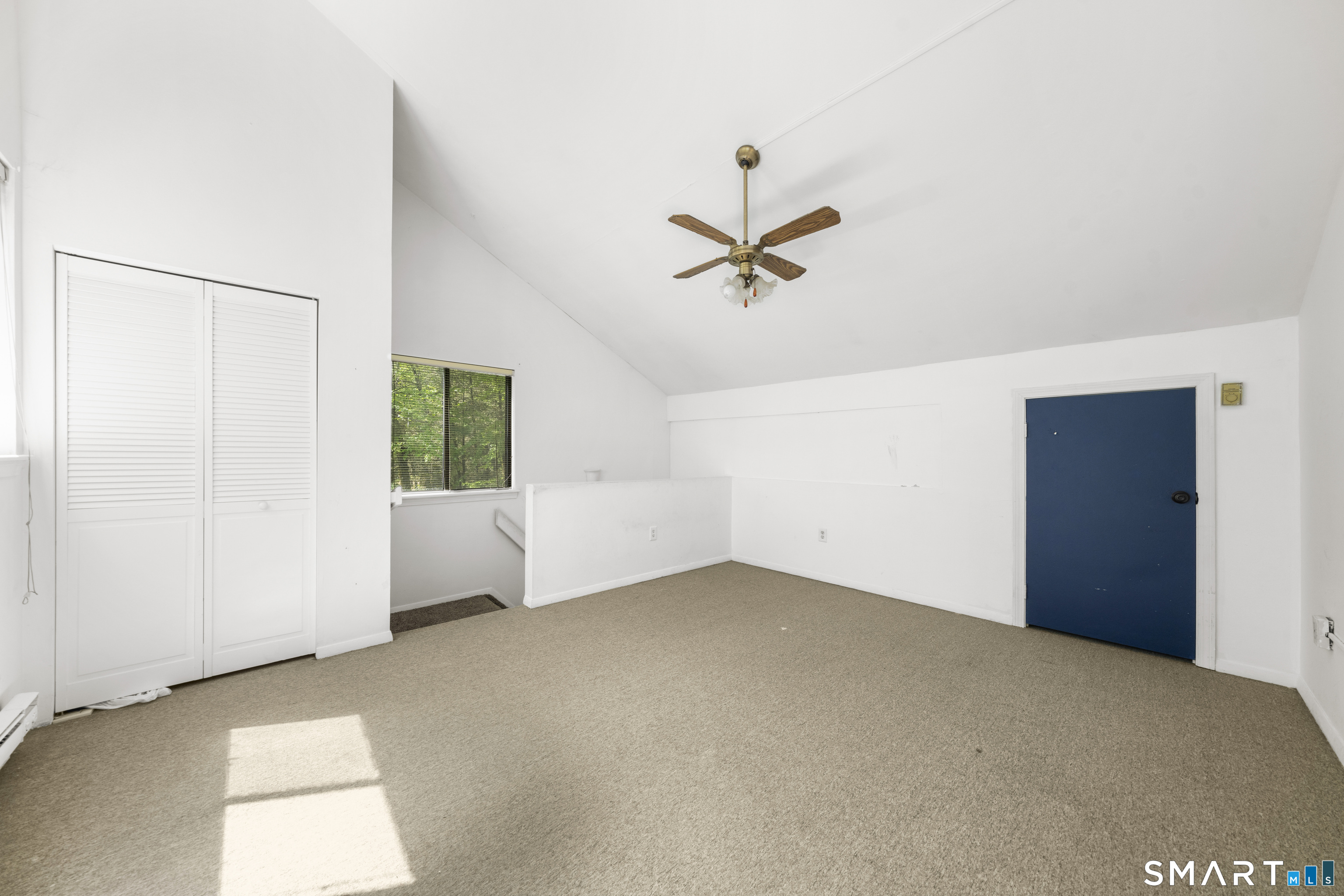 39 Evergreen Road, Unit 39 Torrington, CT 06790 - Photo 16 of 27 a view of an empty room with a window