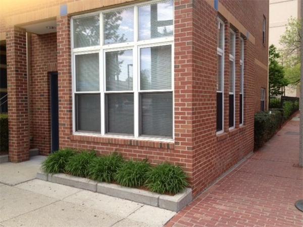 985 Tremont Street, Unit 985 Boston, MA 02120 - Photo 1 of 12 a view of a brick house with a large windows