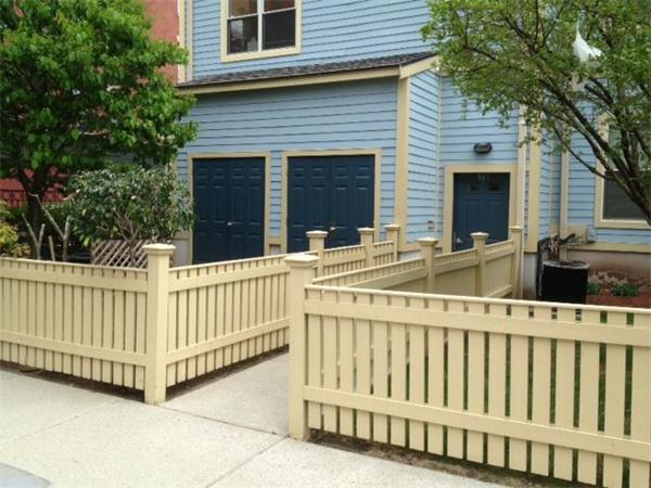 985 Tremont Street, Unit 985 Boston, MA 02120 - Photo 11 of 12 a view of a house with wooden fence