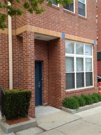 985 Tremont Street, Unit 985 Boston, MA 02120 - Photo 2 of 12 a front view of a house with garden