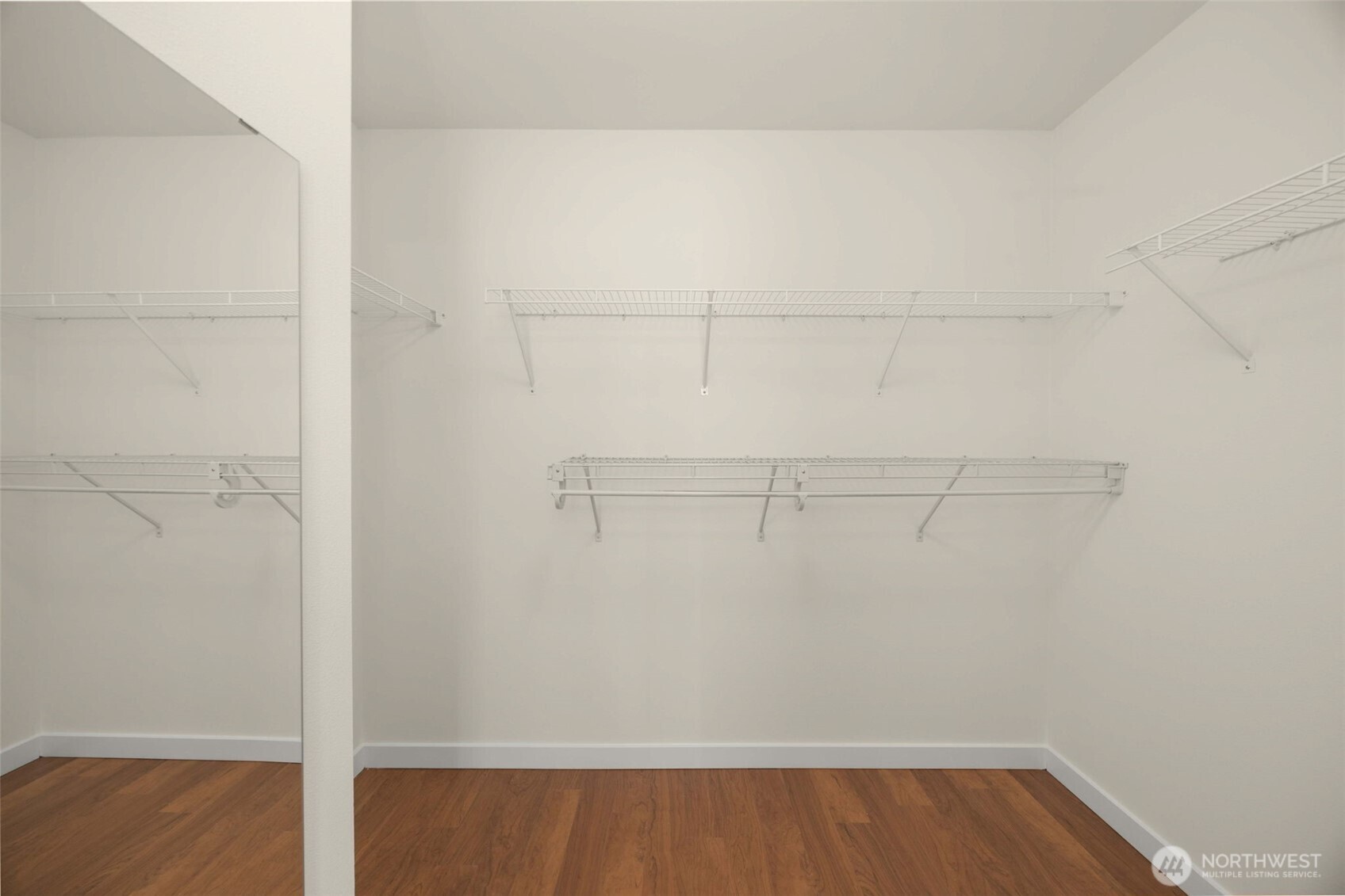 23120 Southeast Black Nugget Road, Unit C1 Issaquah, WA 98029 - Photo 17 of 31 a view of a room with racks on the wall