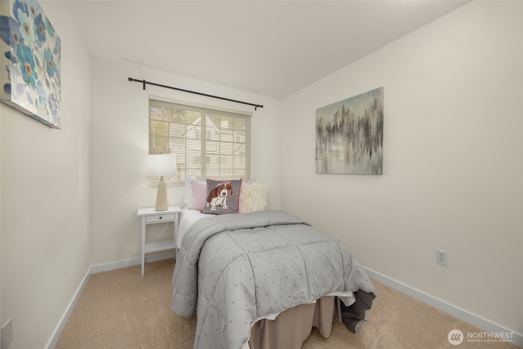 23120 Southeast Black Nugget Road, Unit C1 Issaquah, WA 98029 - Photo 18 of 31 a bedroom with a bed and a window