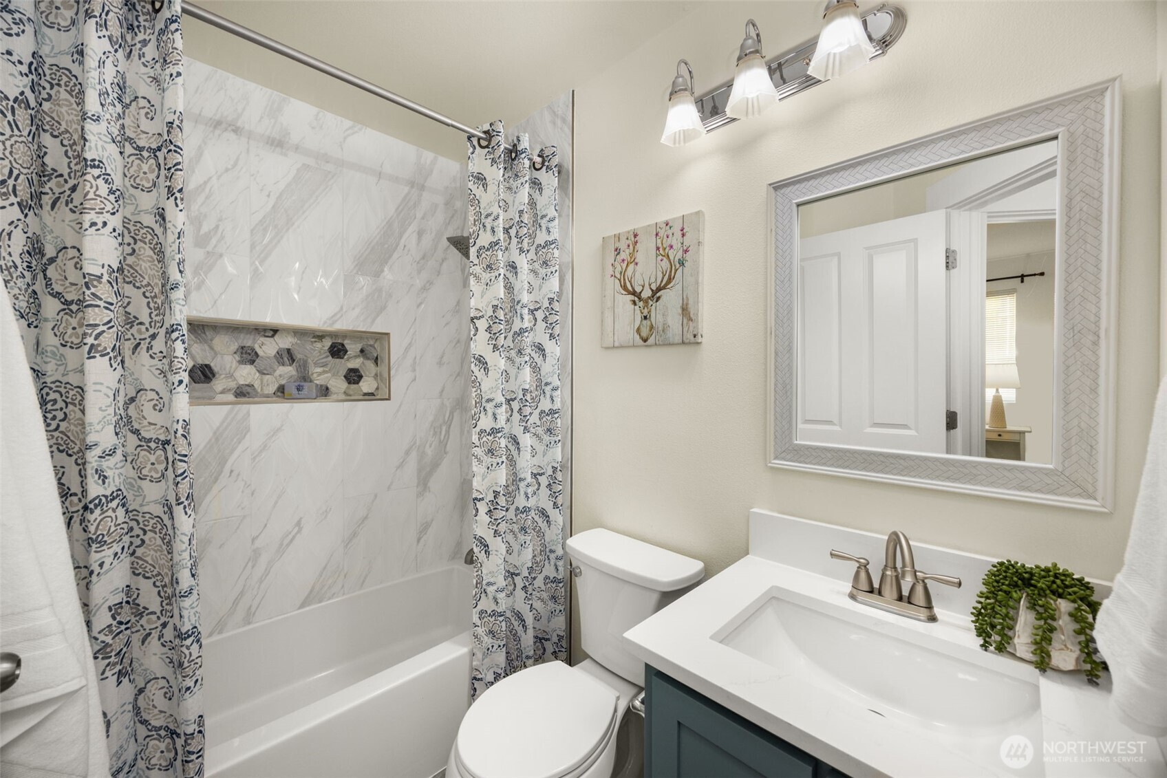 23120 Southeast Black Nugget Road, Unit C1 Issaquah, WA 98029 - Photo 19 of 31 a bathroom with a sink toilet and shower