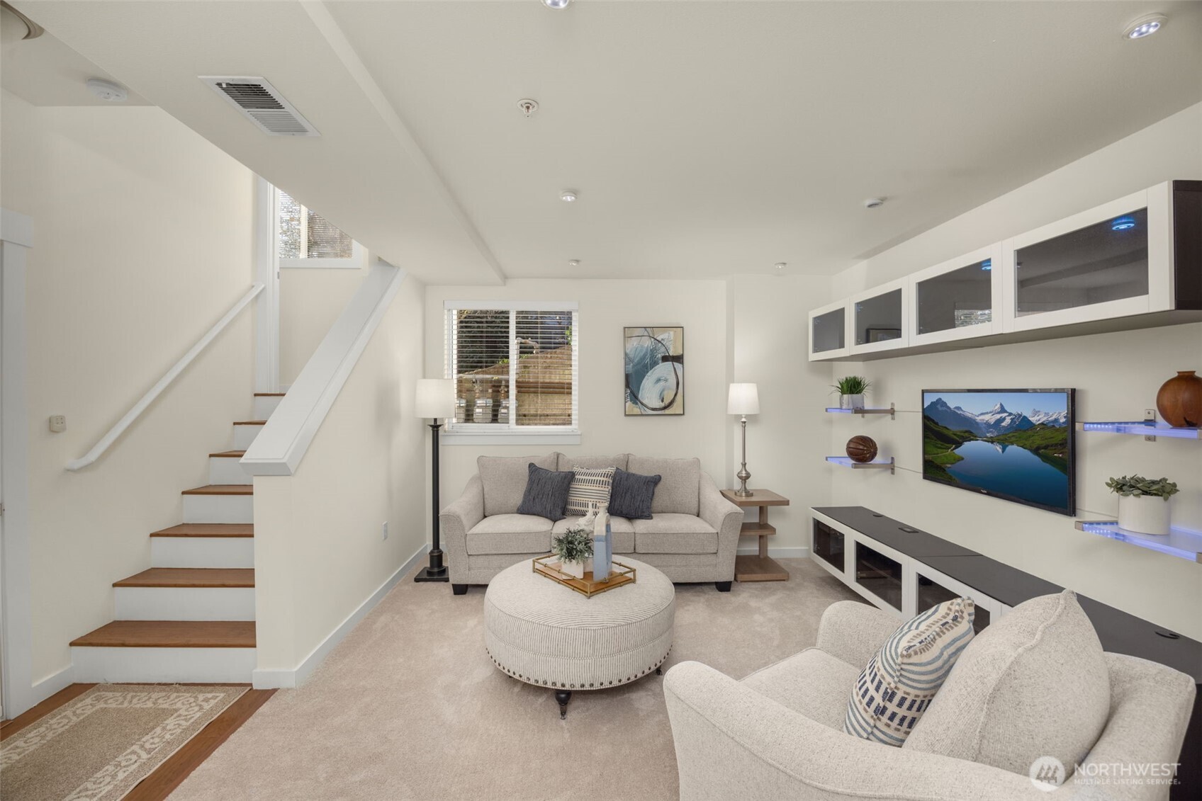 23120 Southeast Black Nugget Road, Unit C1 Issaquah, WA 98029 - Photo 21 of 31 a living room with furniture and wooden floor