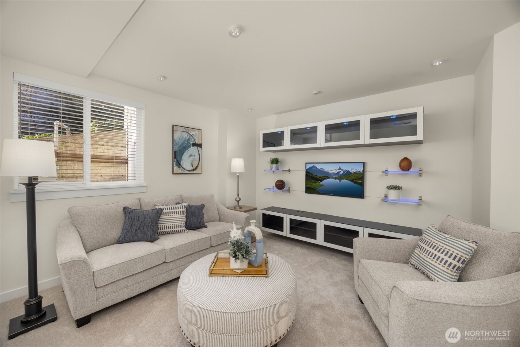 23120 Southeast Black Nugget Road, Unit C1 Issaquah, WA 98029 - Photo 22 of 31 a living room with furniture and window