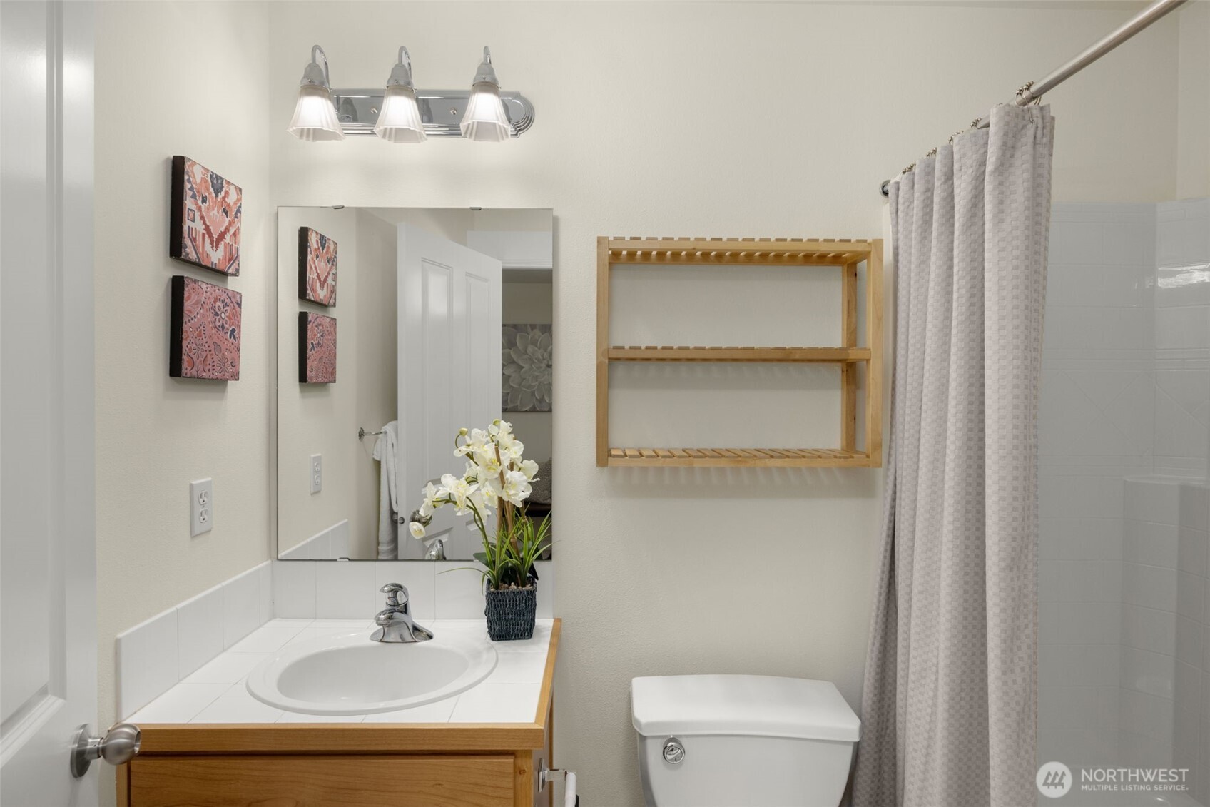 23120 Southeast Black Nugget Road, Unit C1 Issaquah, WA 98029 - Photo 23 of 31 a bathroom with a sink toilet and shower