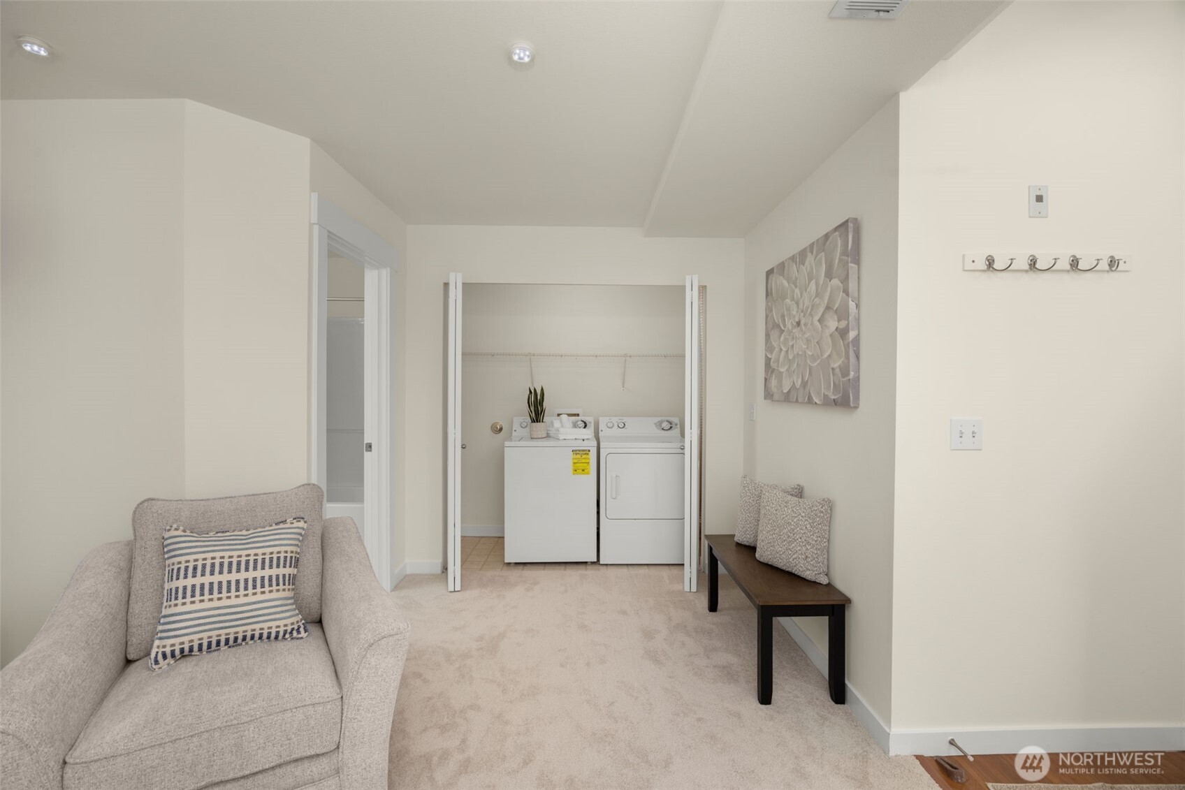 23120 Southeast Black Nugget Road, Unit C1 Issaquah, WA 98029 - Photo 25 of 31 a room with a couch and furniture