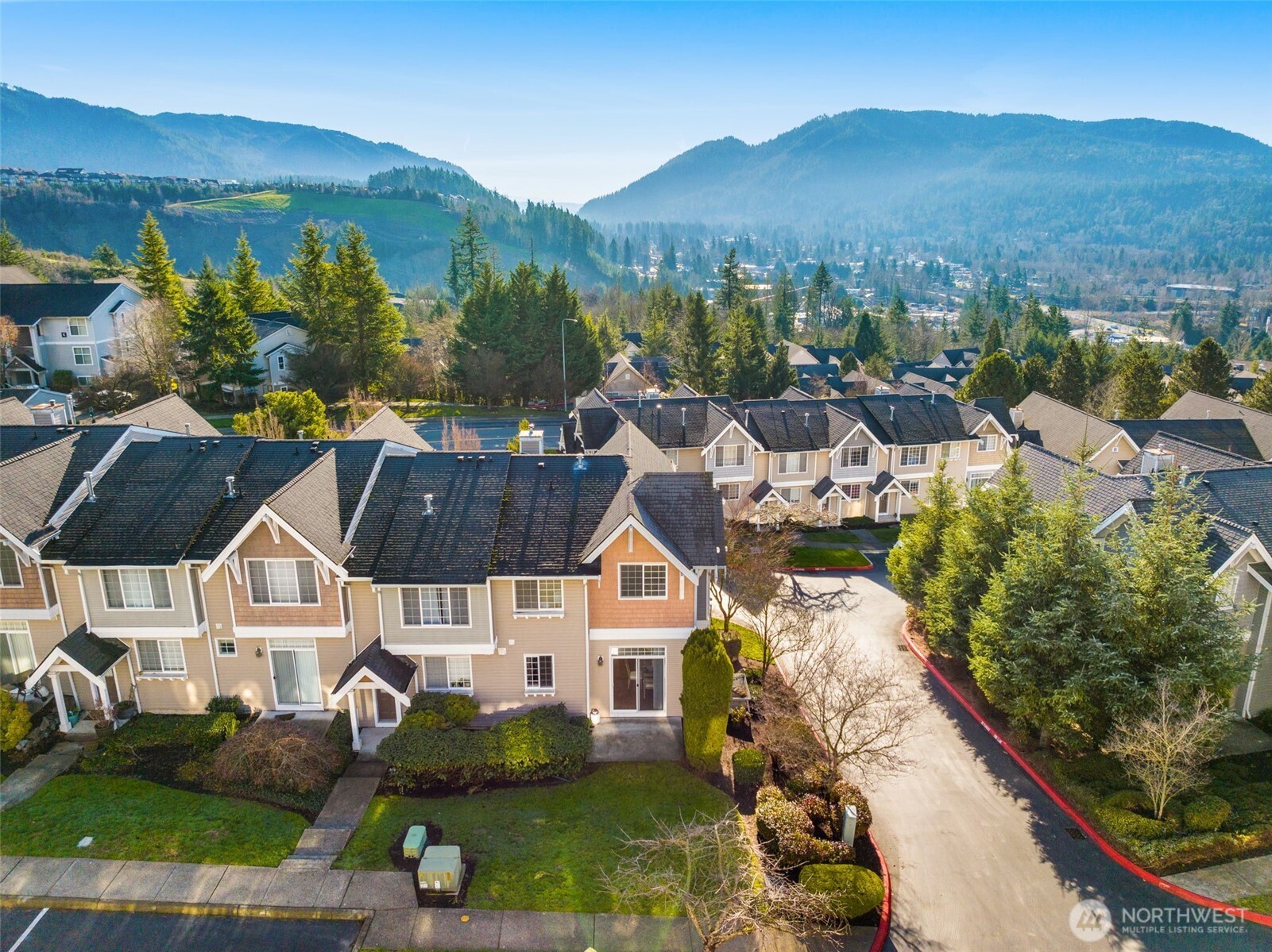 23120 Southeast Black Nugget Road, Unit C1 Issaquah, WA 98029 - Photo 27 of 31 a view of houses with city street