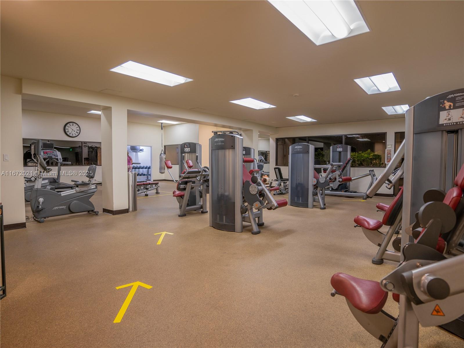 151 Crandon Boulevard, Unit 430 Key Biscayne, FL 33149 - Photo 23 of 26 a view of a room with gym equipment
