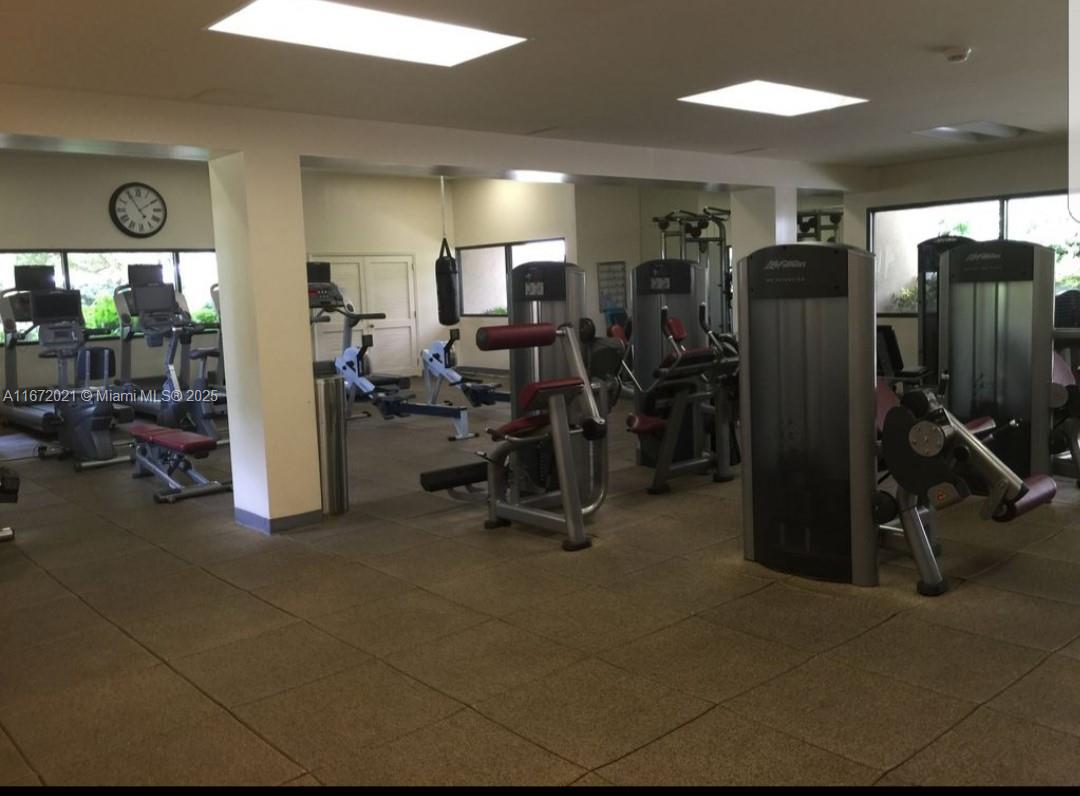 151 Crandon Boulevard, Unit 430 Key Biscayne, FL 33149 - Photo 24 of 26 a view of a room with gym equipment