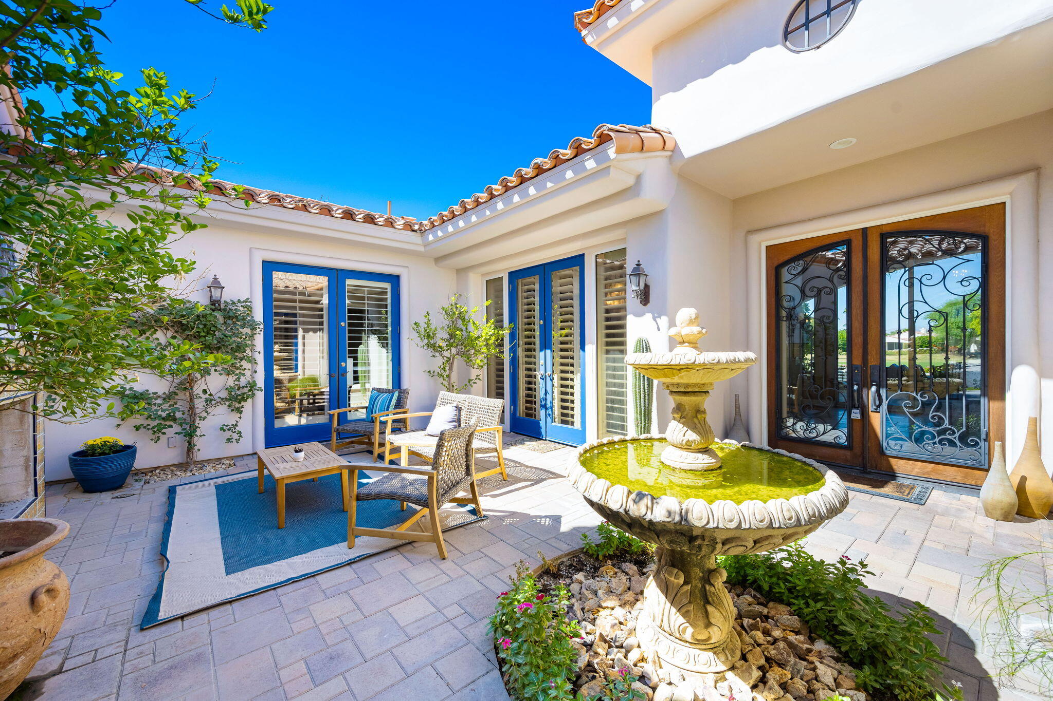 79290 Cetrino La Quinta, CA 92253 - Photo 19 of 74 a view of a backyard with swimming pool and furniture
