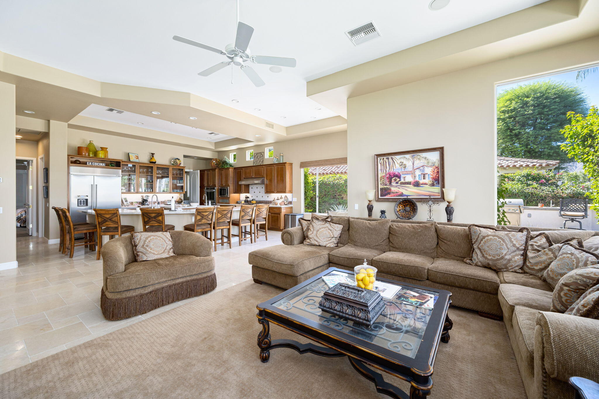 79290 Cetrino La Quinta, CA 92253 - Photo 24 of 74 a living room with furniture and a large window