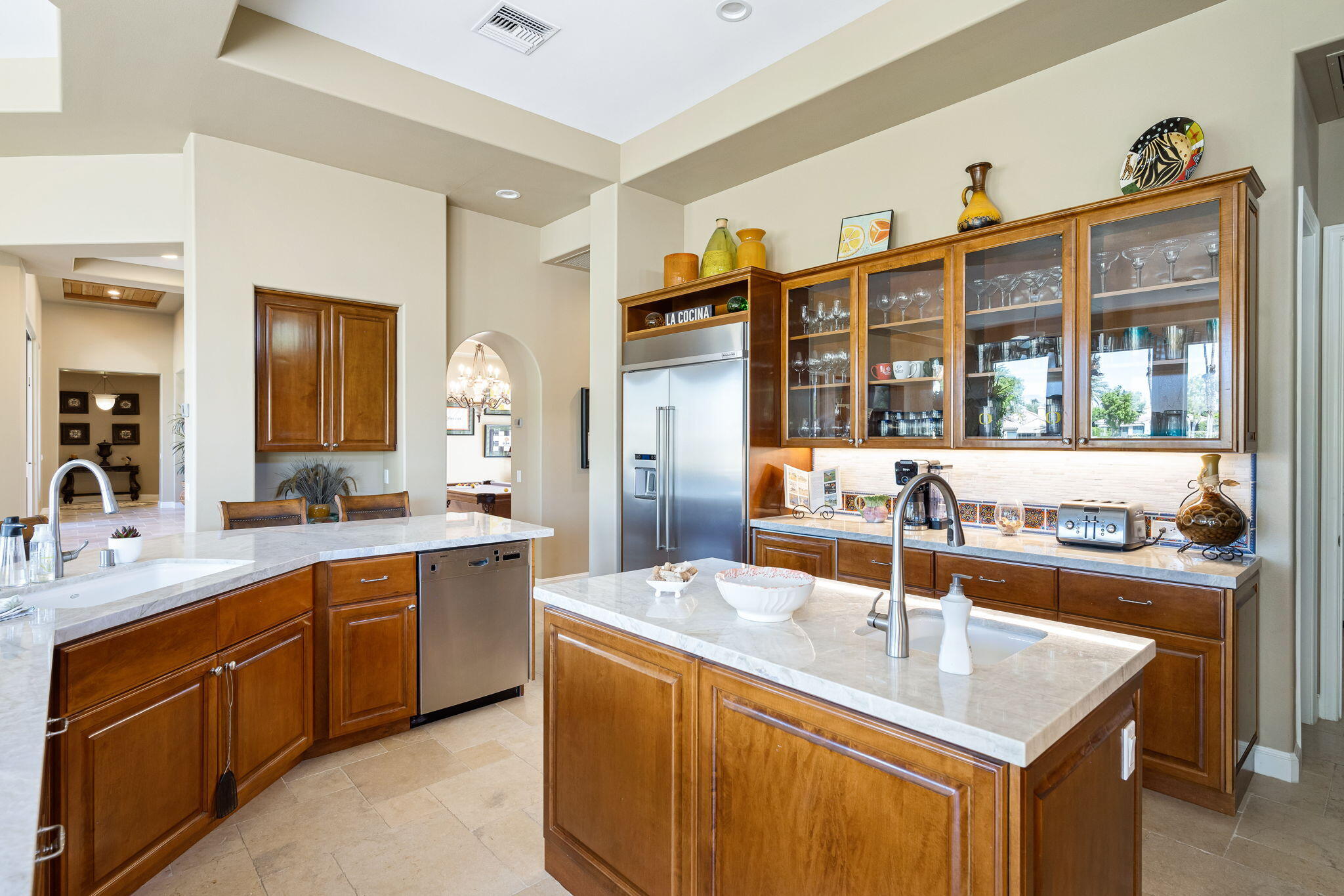 79290 Cetrino La Quinta, CA 92253 - Photo 27 of 74 a kitchen with a sink stove and a refrigerator