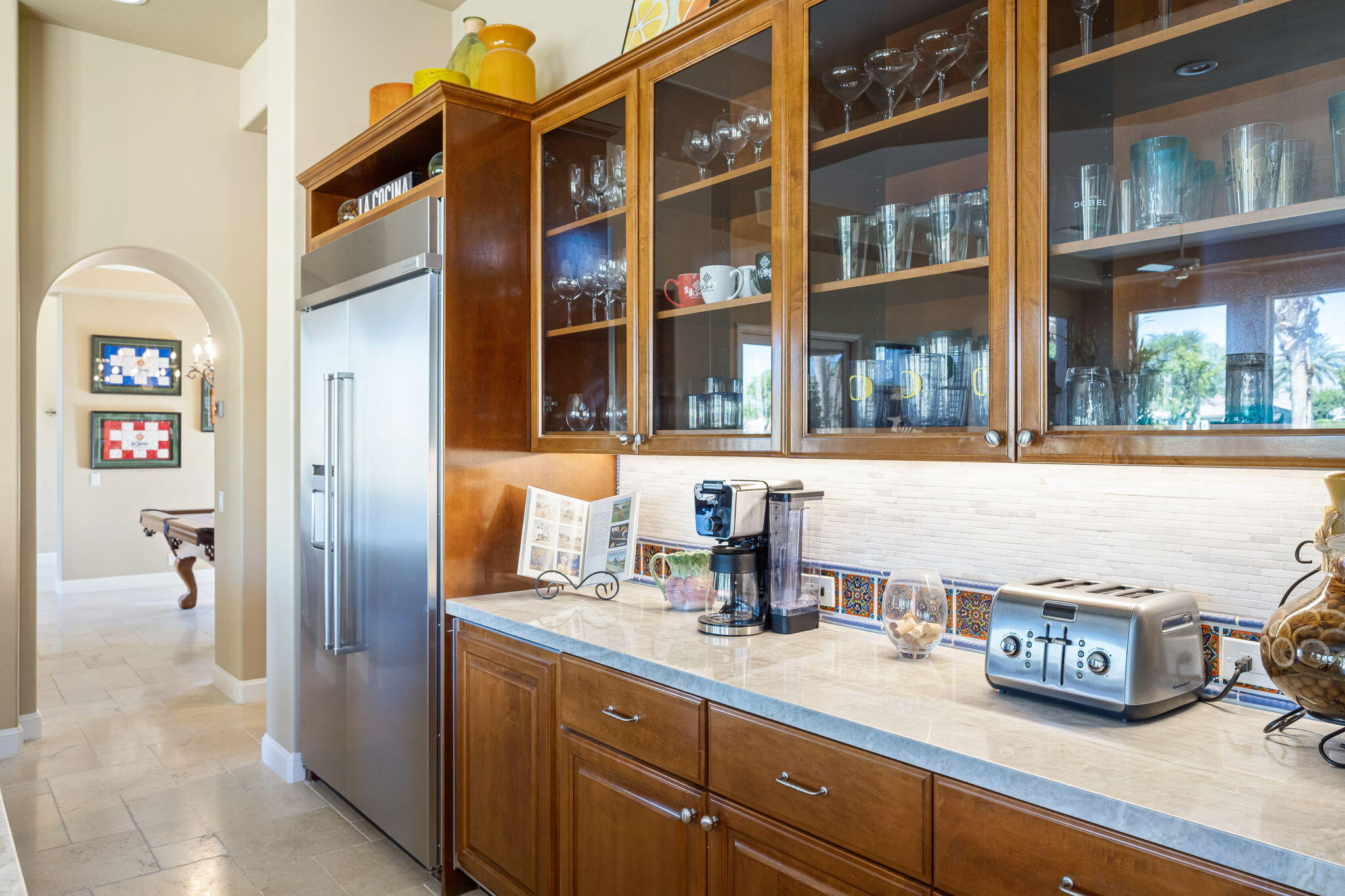 79290 Cetrino La Quinta, CA 92253 - Photo 28 of 74 a kitchen with stainless steel appliances a sink and a cabinets