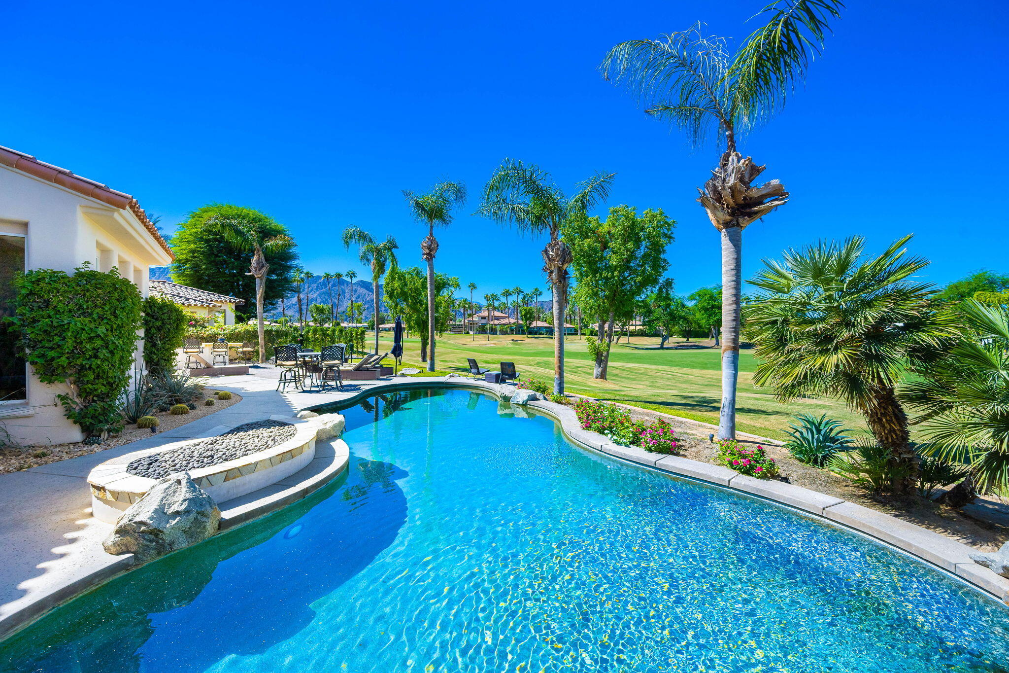 79290 Cetrino La Quinta, CA 92253 - Photo 44 of 74 a view of swimming pool with outdoor seating and yard