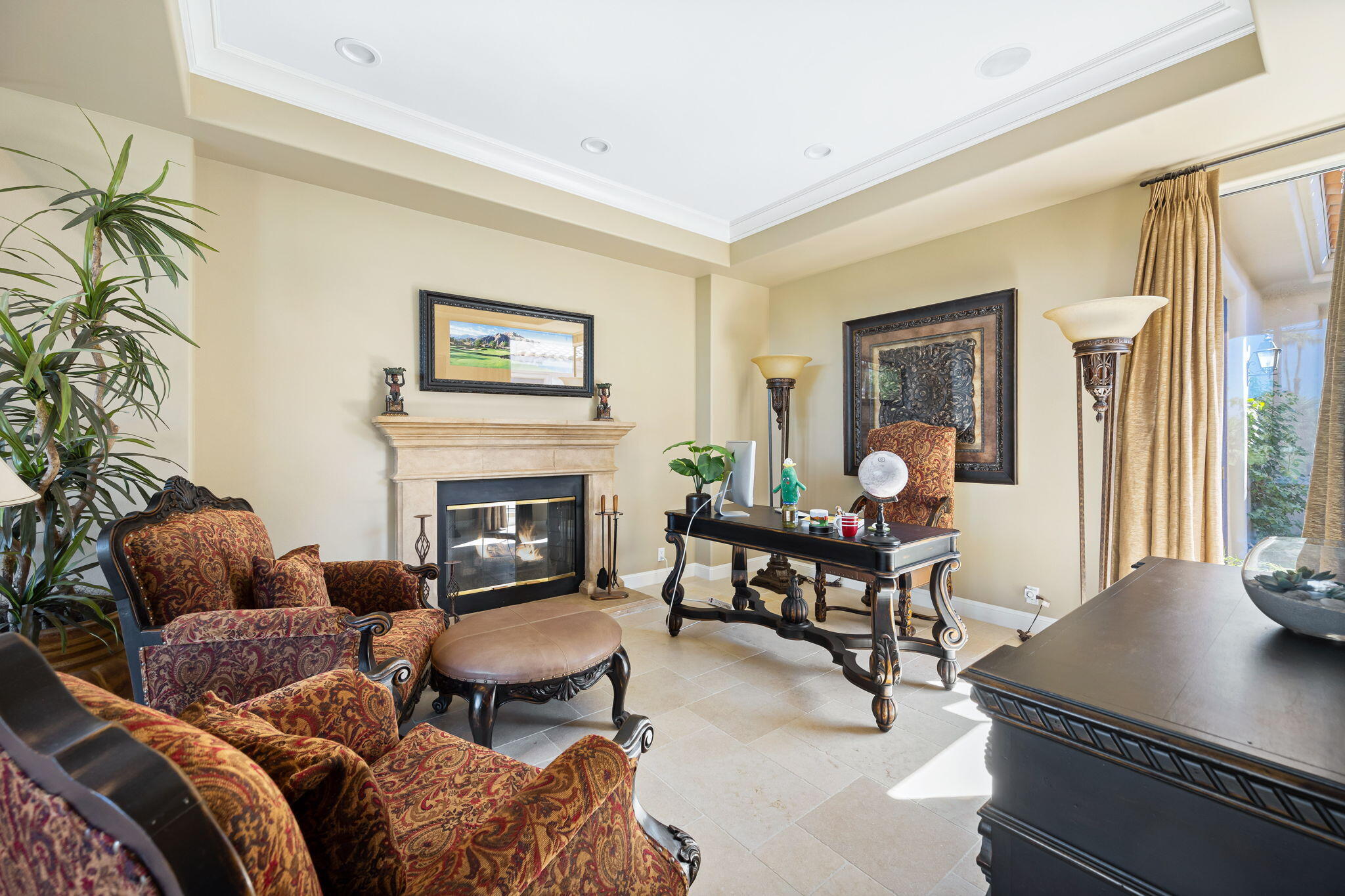 79290 Cetrino La Quinta, CA 92253 - Photo 56 of 74 a living room with furniture and a fireplace