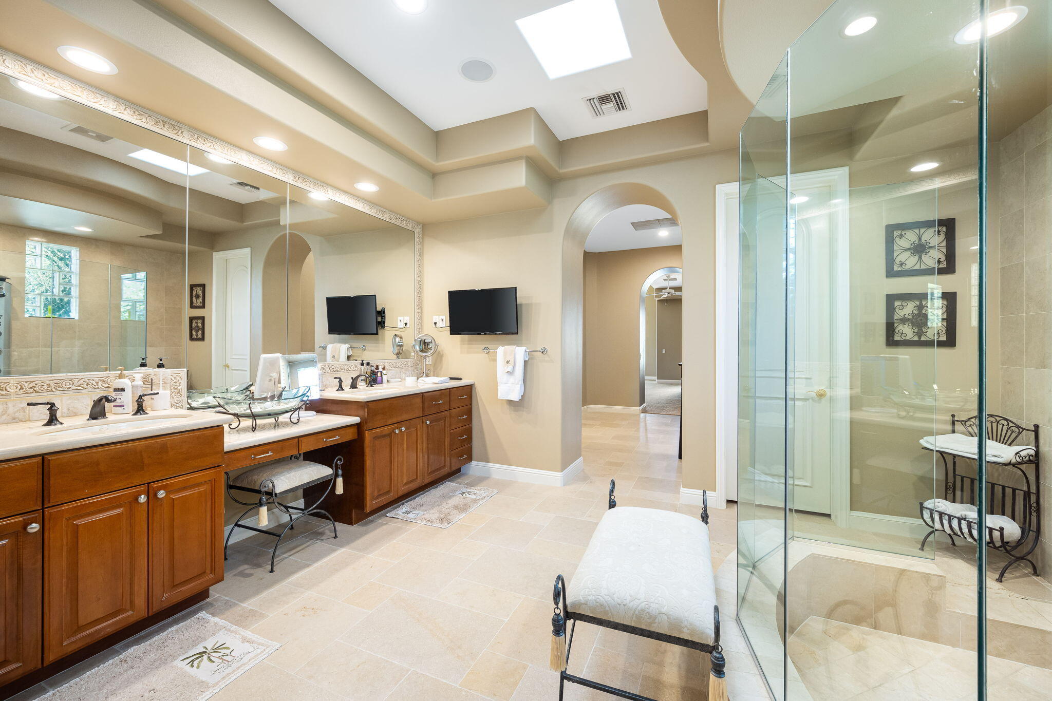 79290 Cetrino La Quinta, CA 92253 - Photo 62 of 74 a large bathroom with a glass door shower and sink