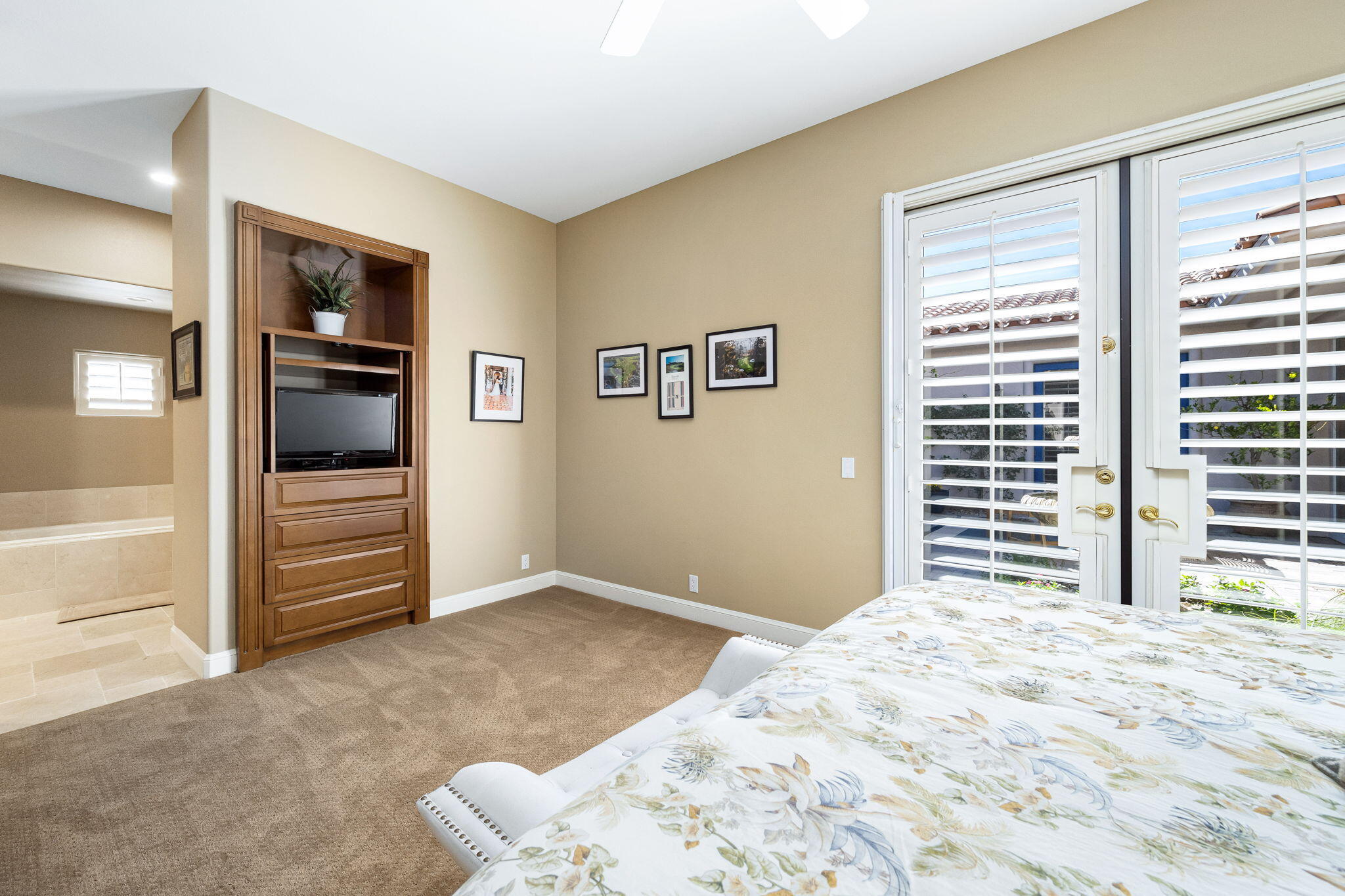 79290 Cetrino La Quinta, CA 92253 - Photo 67 of 74 a bedroom with a bed and a view of kitchen