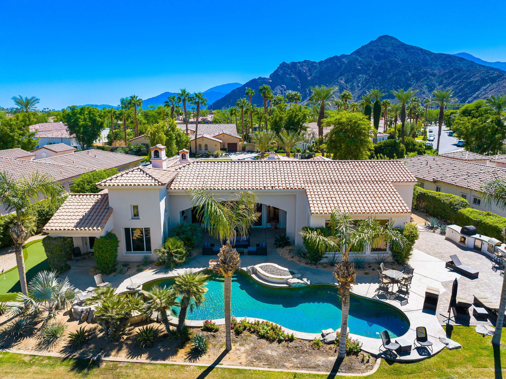 79290 Cetrino La Quinta, CA 92253 - Photo 7 of 74 an aerial view of a house with garden space and street view