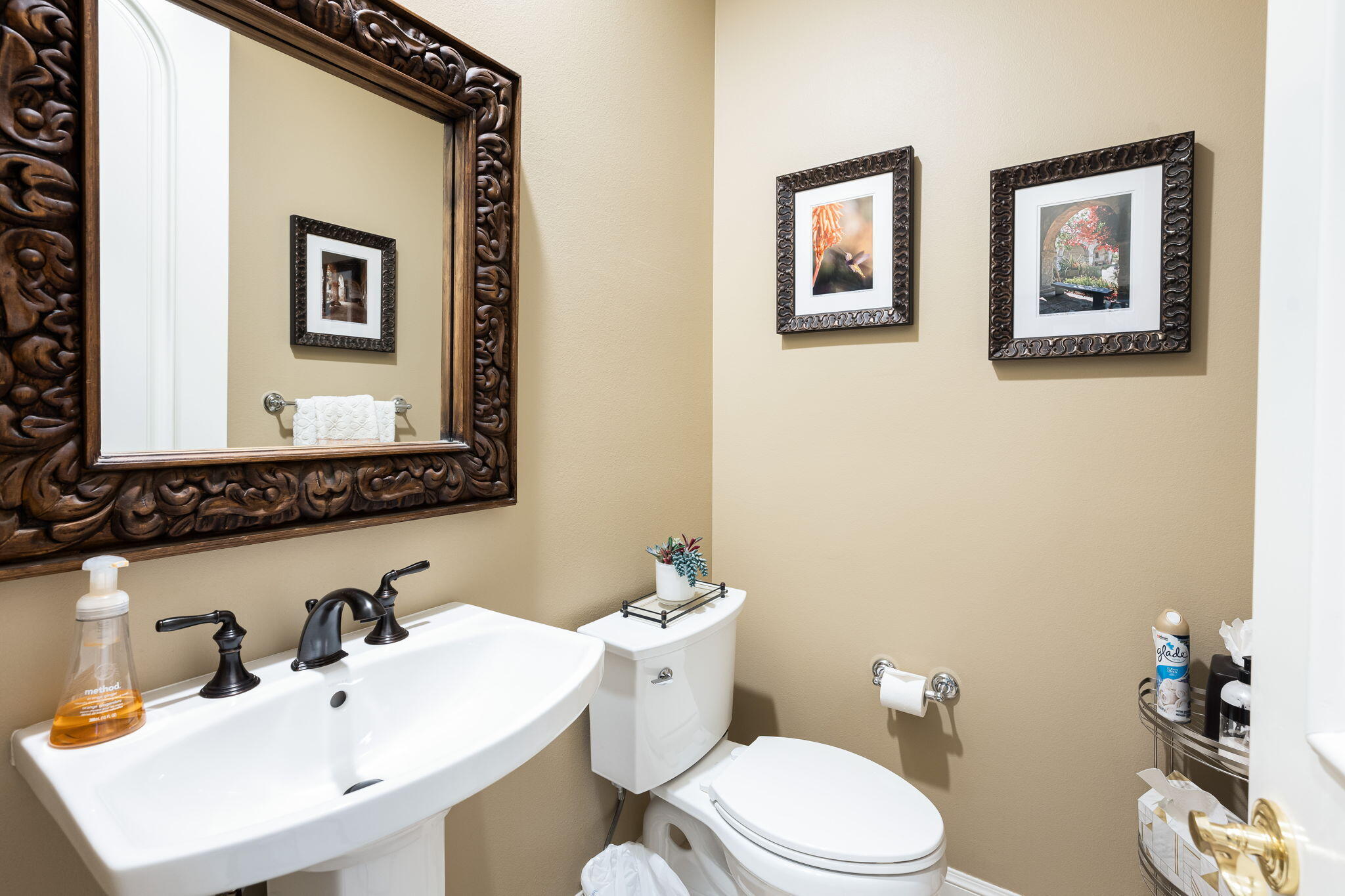79290 Cetrino La Quinta, CA 92253 - Photo 73 of 74 a bathroom with a toilet a sink and mirror