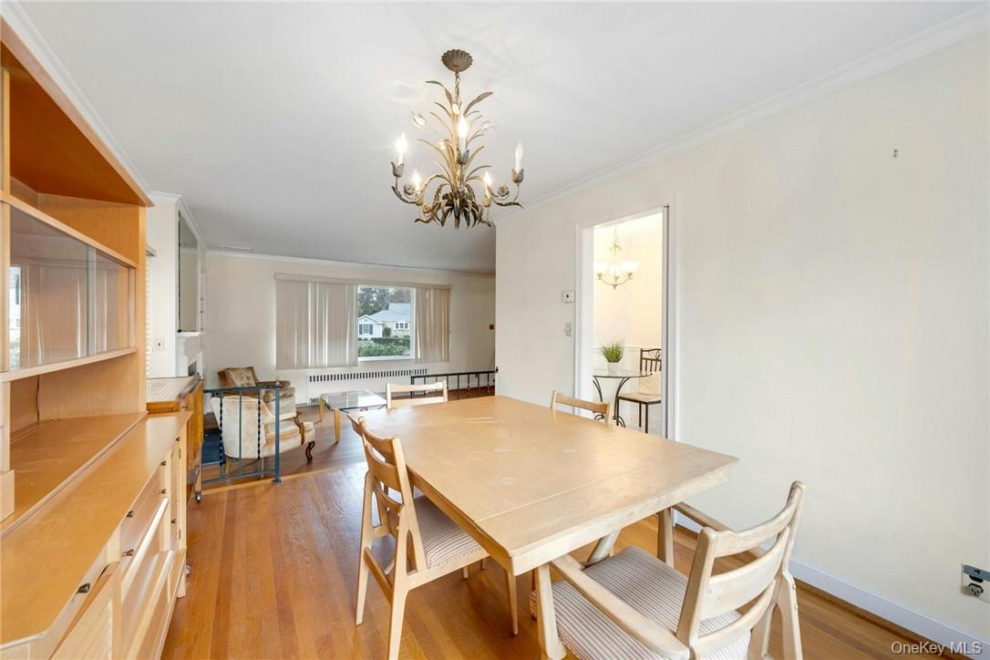 29 Old Orchard Road Rye Brook, NY 10573 - Photo 7 of 32 a view of a dining room with furniture and wooden floor