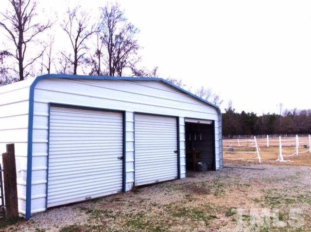 985 Mitchell Road Angier, NC 27501 - Photo 11 of 18 a backyard of a house