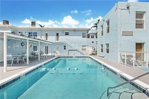 315 Van Buren Street, Unit 106B Hollywood, FL 33019 - Photo 11 of 14 Pool with sun and shade areas