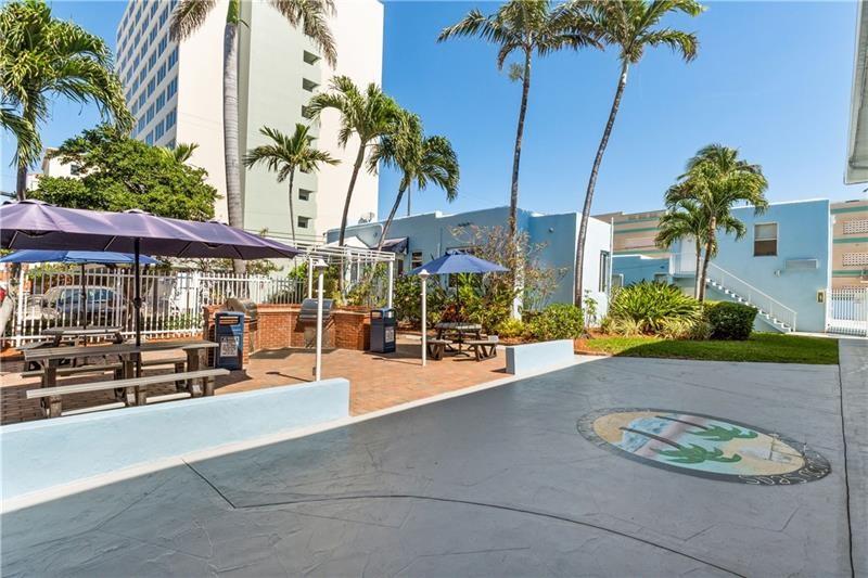 315 Van Buren Street, Unit 106B Hollywood, FL 33019 - Photo 8 of 14 Picnic-barbecue area at the complex